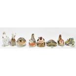 ROYAL CROWN DERBY; a collection of eight animal paperweights to include 'Snowy Rabbit' complete with