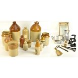 A collection of assorted vintage kitchenalia items to include stoneware flagons and ginger beers,