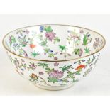A 20th century Chinese floral decorated bowl with character marks to base, diameter 20cm.