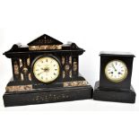 A Victorian black slate mantel clock, the circular enamelled dial set with Roman numerals, with Japy