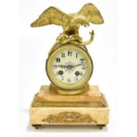 A 19th century French mantel clock with gilt metal and serpent eagle surmount above circular dial