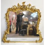 A good and large late 18th century carved giltwood over-mantel mirror, the central ho-ho bird within