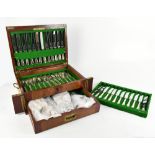 A military style mahogany cased canteen of silver plated cutlery, on the whole being a twelve