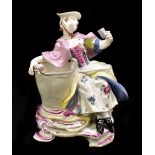 DERBY; an 18th century figure of a female leaning upon a large bucket and holding a cup in left