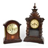 JUNGHANS; an inlaid oak cased mantel clock, the silvered dial set with Arabic numerals, height 31.