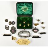 A small group of costume jewellery including a cased set of four studs, various brooches and a