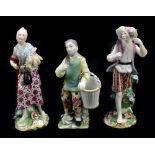 A pair of early 19th century English porcelain figures of garden labourers, height 13cm, and a