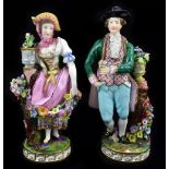 MINTON; a pair of late 19th century figures of a dandy and his companion, both on gilt heightened