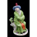 CHELSEA; a mid 18th century figure of a seated Chinese gentleman, red anchor period with old owner's