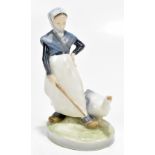 ROYAL COPENHAGEN; a figure of a goose girl, printed and painted marks to base, height 19.5cm (af).