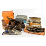A collection of woodworking planes, the majority fitted in original boxes including Stanley 71,