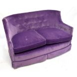 A recently reupholstered purple button back two seater settee.