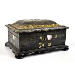 A Victorian papier-mâché work box with mother of pearl inlay and gilt scrolling decoration, width