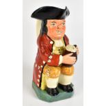 A late 19th century Staffordshire Toby jug modelled holding a foaming quart of ale, height 24.5cm.