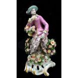 BOW; an 18th century figure representing Smell from the 'Senses' series with pierced scrolling base,