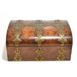 A good Victorian brass bound burr walnut dome topped sewing box, the hinged cover enclosing a