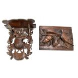 A Black Forest carved oak wall bracket decorated with a central stag, height 31cm, together with a