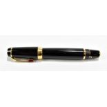 MONT BLANC; a twist action fountain pen with 14k nib, length when extended 11cm.Additional