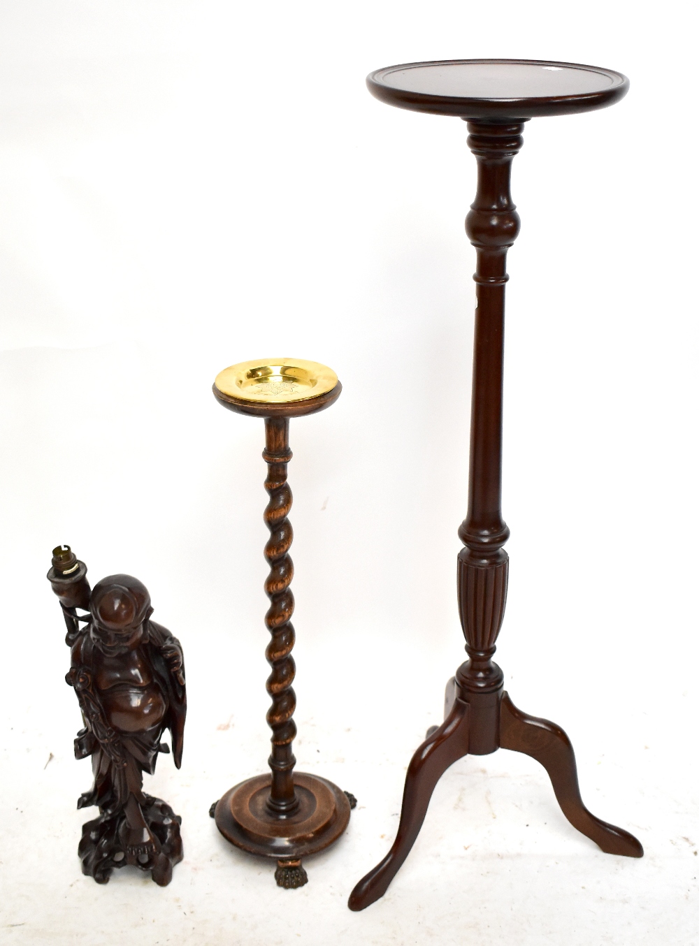 An Eastern carved hardwood lamp base modelled as the Buddha, height including fitment 49cm, a