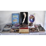 ROYAL COMMEMORATIVE; a collection of books and tins, all relating to the Royal Family.