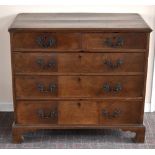 A late 18th century walnut cross-banded chest of two short and three long graduated drawers raised