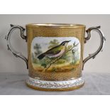 A large mid-19th century English hand-painted loving cup, the front decorated with a huntsman out