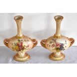 ROYAL WORCESTER; a pair of blush ivory vases with fluted necks and oval bodies decorated with