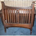 An Arts & Crafts style oak single bedstead, width 93cm.Additional InformationSold with a sprung