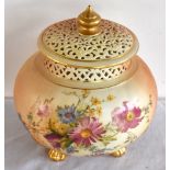 ROYAL WORCESTER; a blush ivory pot pourri vase with inner cover and pierced outer cover, the body