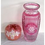 A Bohemian pink tinted and clear cut glass vase, height 33cm, and a ribbed pink tinted vase with