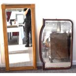 A Victorian gilt framed rectangular wall mirror with fluted frame, 134 x 62cm, and a dressing