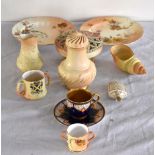 ROYAL WORCESTER; a group of blush ivory ware including two side plates, sugar caster with gilt plug,