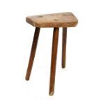 A 19th century Elm Cutters Stool, on three ringed legs, height 55cm.