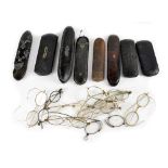 Eighteen pairs of antique and vintage spectacles to include eight pairs in cases to include