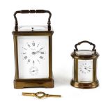An Angelus French brass chiming carriage clock,