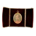 A 19th century portrait miniature of an army officer in red tunic,