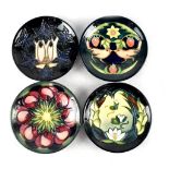 Four modern Moorcroft pin dishes, patterns to include 'Cluny', 'Strawberry Thief',