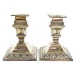 A pair of Victorian hallmarked silver dwarf candlesticks, London 1892, Charles Boyton II,