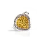 A 9ct white gold ladies' pear-shaped dress ring, set with yellow stones and white diamond surround,