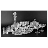 A large quantity of matching and non-matching cut glass and crystal drinking glasses to include