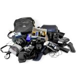 Various cameras, lenses and equipment to include a Canon EOS 1000 SLR camera,