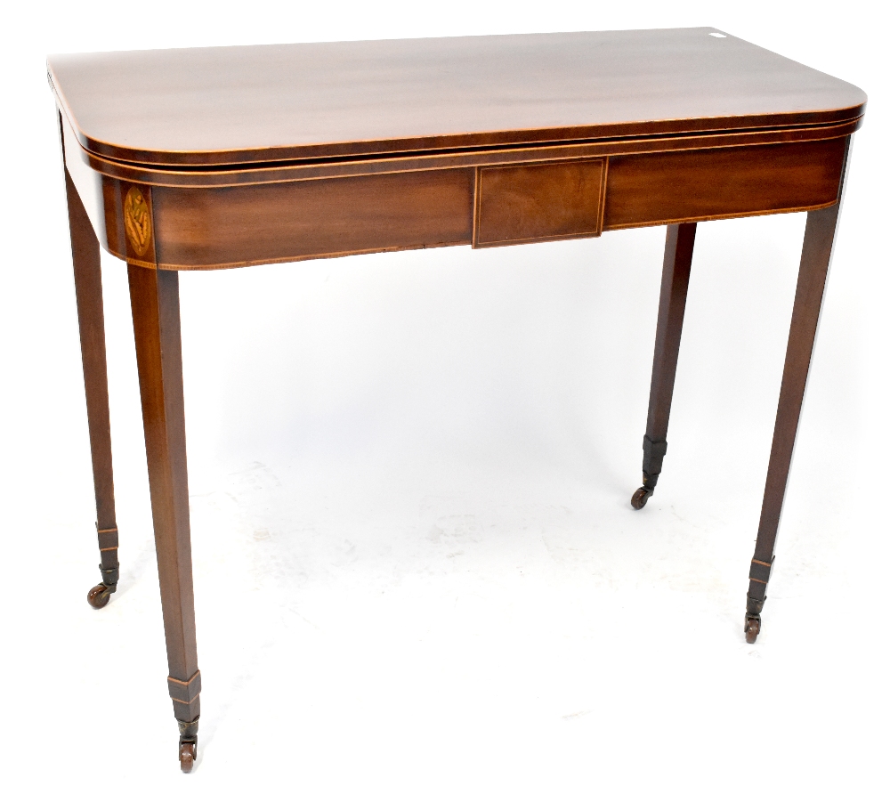 A 19th century mahogany tea table,