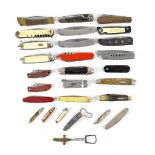 A collection of vintage and modern small pocket/penknives, some are multitool,