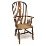 A late 18th/early 19th century high-back Windsor chair, with Christmas tree splat,