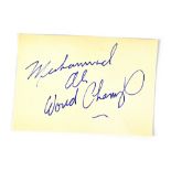 Muhammad Ali; a signed piece of card 'Muhammad Ali World Champ'.