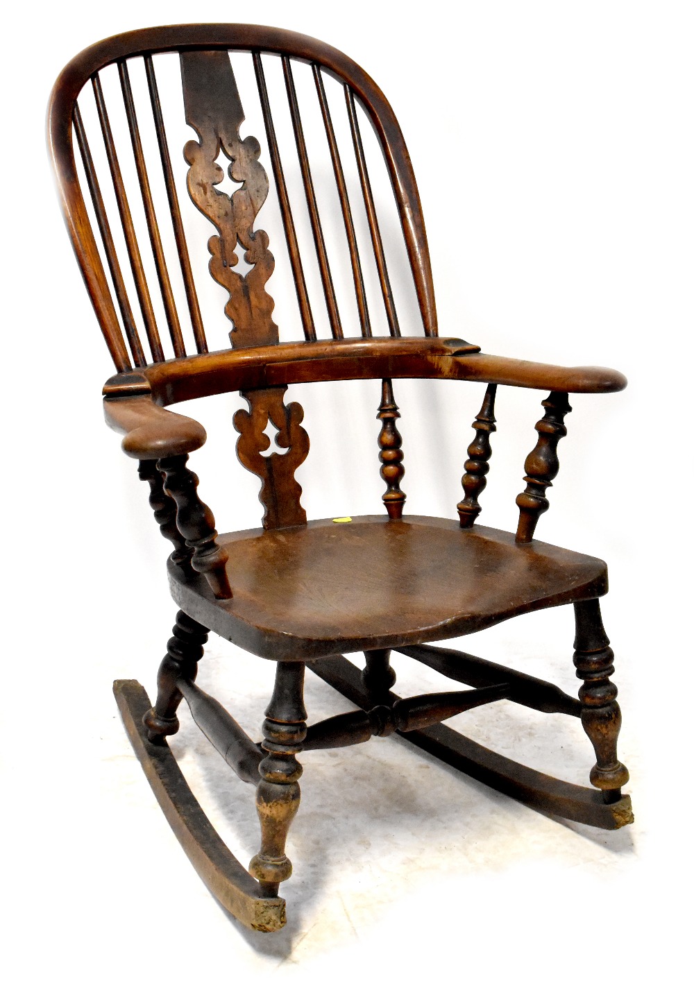 A 19th century provincial Windsor rocking chair, hoop back,