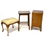 A mahogany dressing table stool with leatherette overstuffed seat, on cabriole legs,