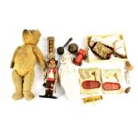 Various antique dolls and baby related items to include a hand held flip doll,