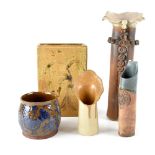 A collection of five pieces of studio and retro pottery to include a cylindrical vase with abstract