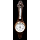 An oak-cased banjo barometer with attached thermometer, height 88cm.